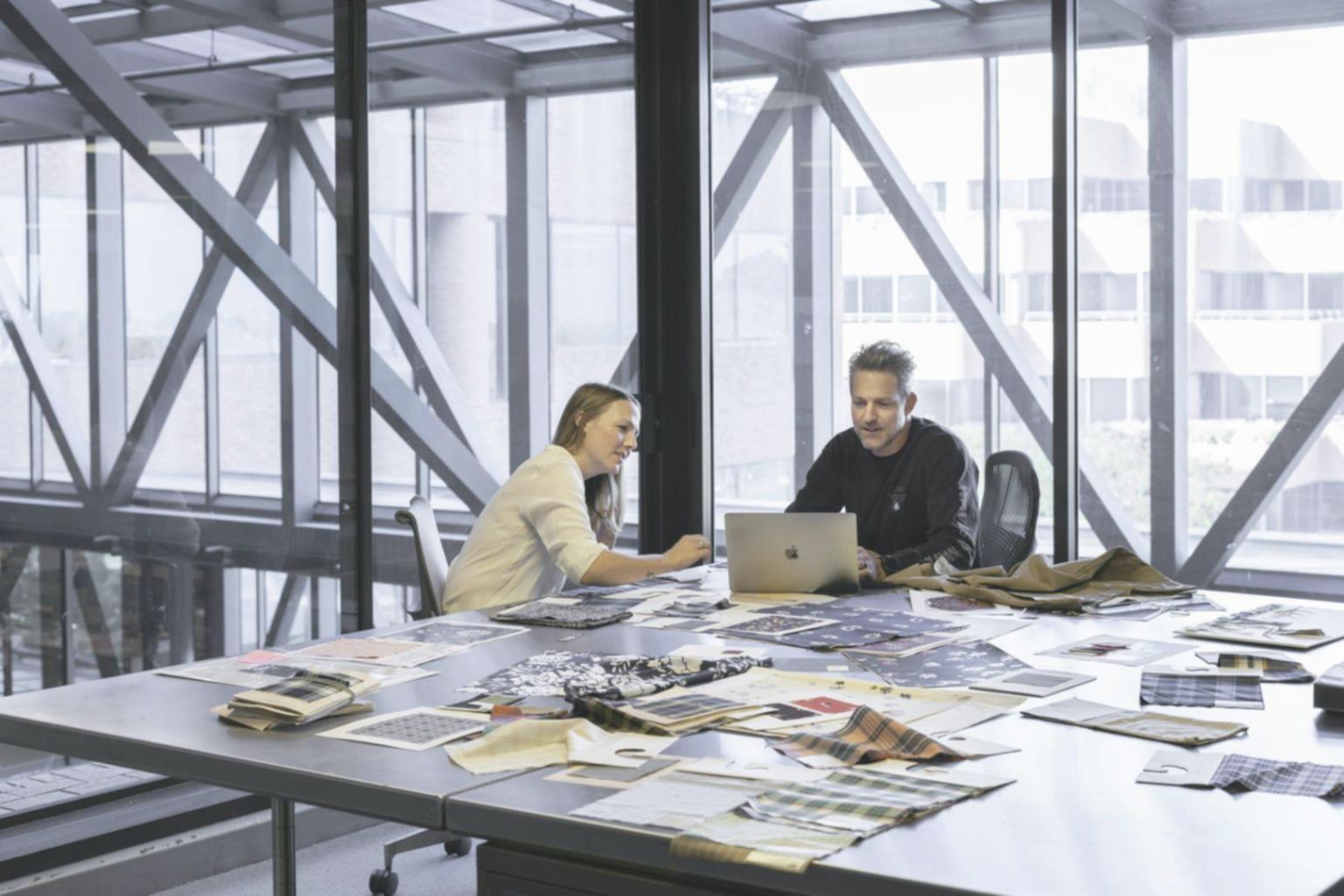 Business meeting discussing financial performance metrics